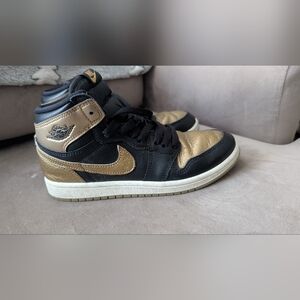 Nike Air Jordan 1 Retro High OG Black and Gold Sneakers